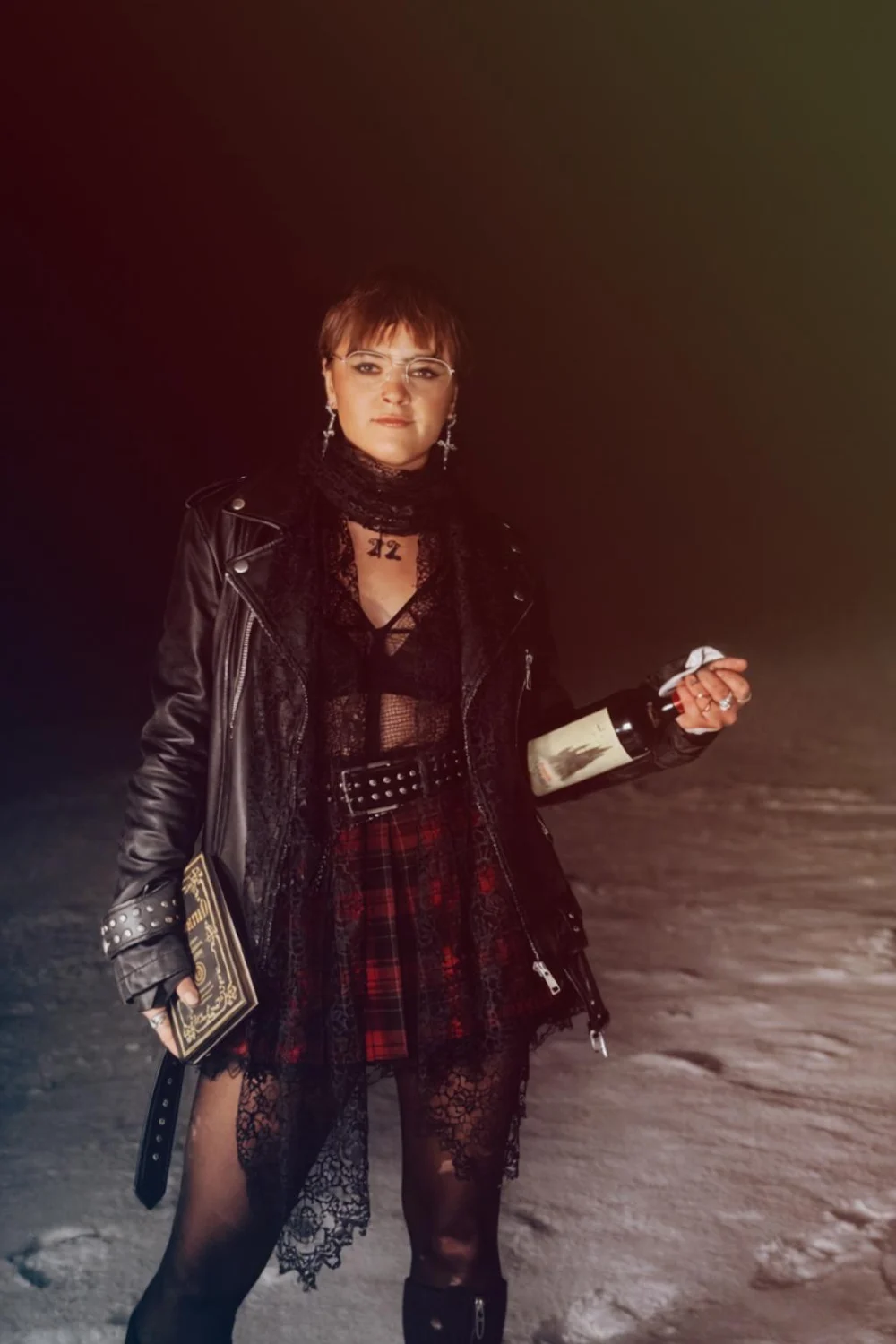 Andreea in a dark layered outfit
