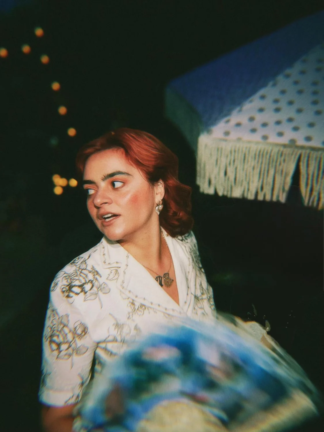 Andreea in a floral shirt