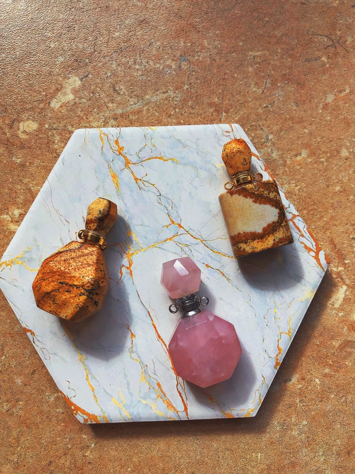 Small stone bottles on a tray